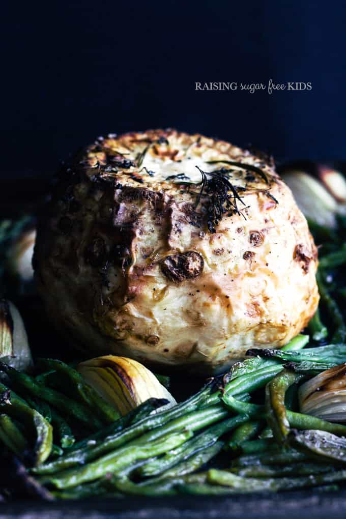 Whole-Baked Celeriac (Celery Root) with Roasted Onion Gravy | Raising Sugar Free Kids - this vegan roast dinner is indulgent, sweet, smoky and completely delicious! It makes a nice low-maintenance weekend meal, but also looks and tastes "showstopperish" enough to be an Easter main. Low carb, gluten free, paleo, vegan and generally delish! :) #sugarfree #lowcarb #paleo #glutenfree #vegan