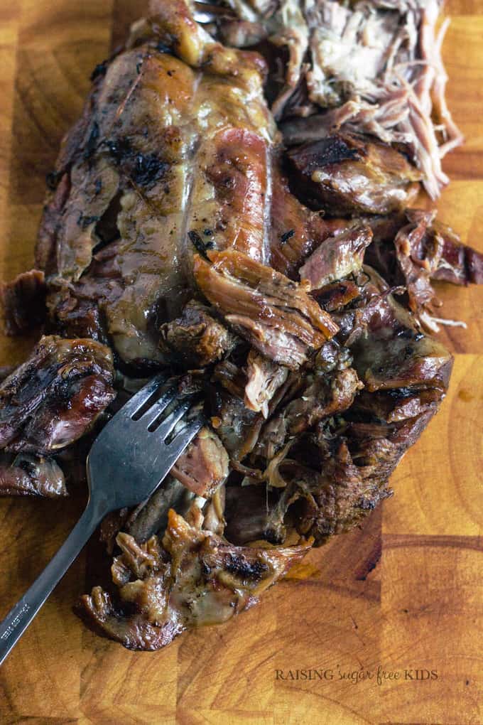 Slow Cooked Lamb with Sugar Free Mint Sauce | Raising Sugar Free Kids - delicious, tender, melt-in-your-mouth lamb served alongside a sugar free sweet-sour fresh mint sauce - this is an impressive Easter recipe that takes just a few mins of prep time and is easy on the purse-strings! #sugarfree #easter 