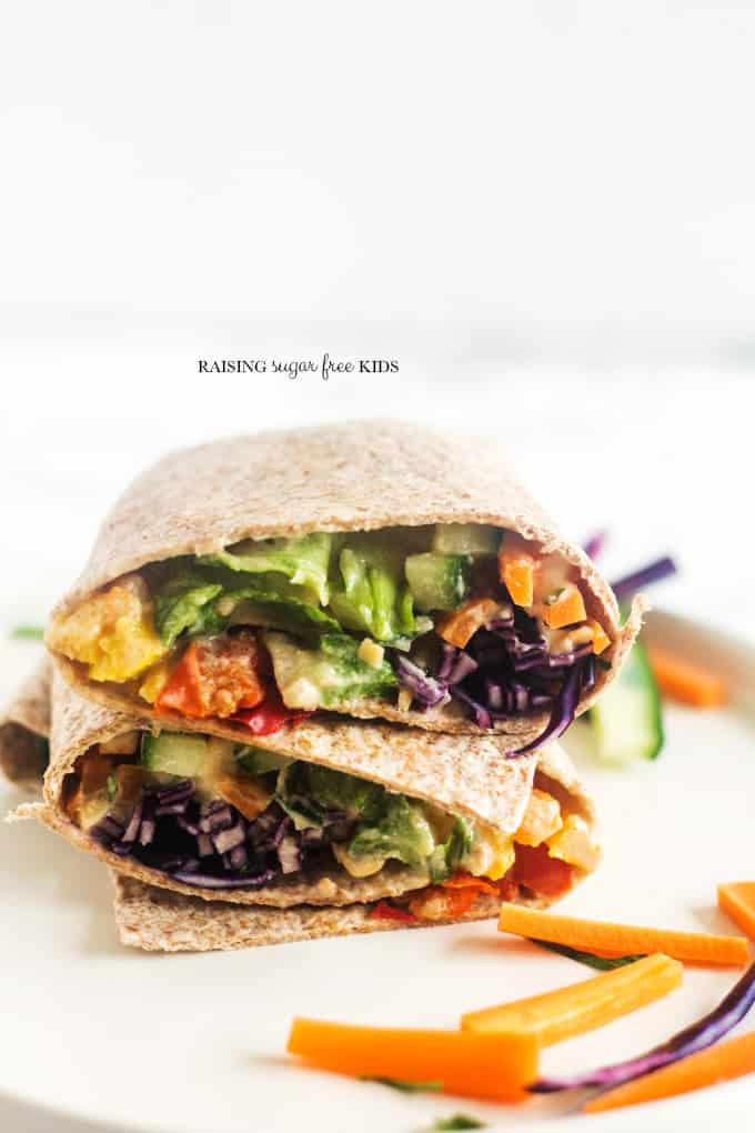 Rainbow Wraps with Peanut Sauce | Raising Sugar Free Kids - this delicious lunch is packed full of vegetables in all colours, and covered in a simple, yummy sugar free peanut sauce. Making "eating the rainbow" fun and easy. #sugarfree #vegpower #eattherainbow