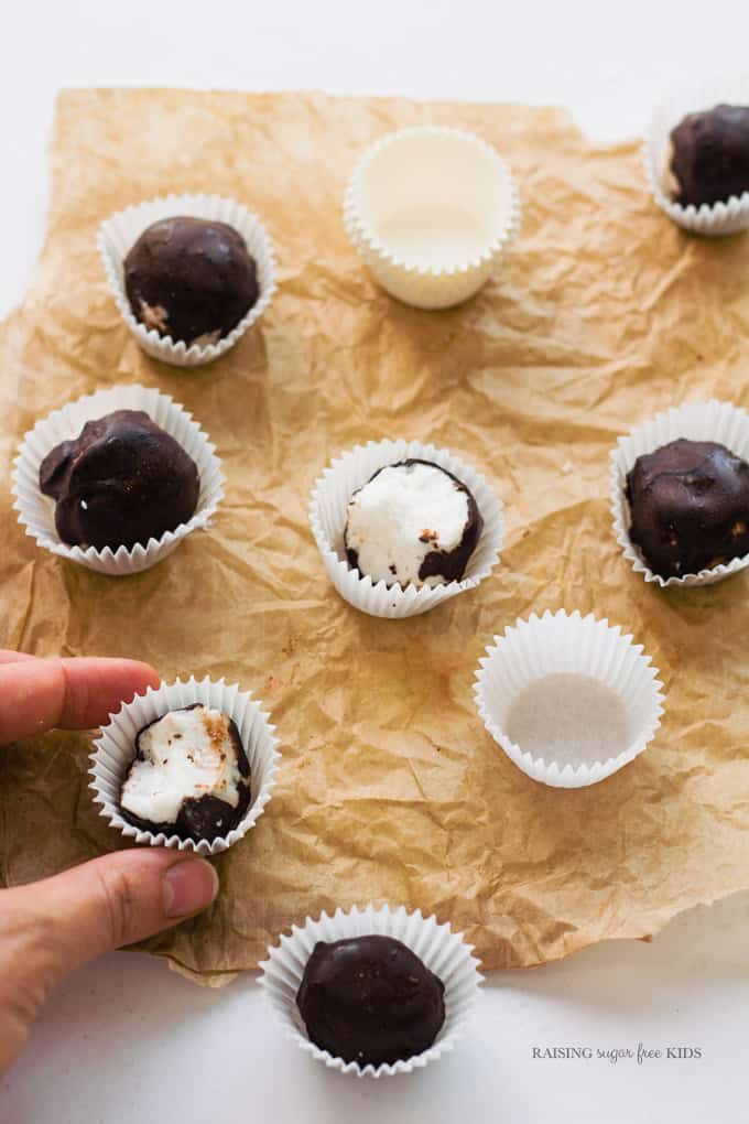 Low Sugar Coconut Truffles | Raising Sugar Free Kids - these super simple coconut truffles are extremely low in sugar, gluten & dairy free, and a perfect quick filling snack. Rich and delicious. #sugarfree #lowcarb #glutenfree #vegan 