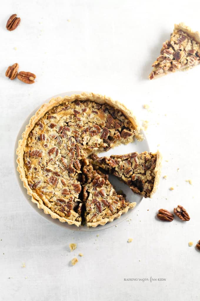 Lower Sugar Pecan Pie (Gluten Free) | Raising Sugar Free Kids - every bit as delicious as the original, this pecan pie is gluten free and has only 1/3 of the sugar, all of it slow-releasing. Perfect for a healthier Thanksgiving this year. #glutenfree #sugarfree 