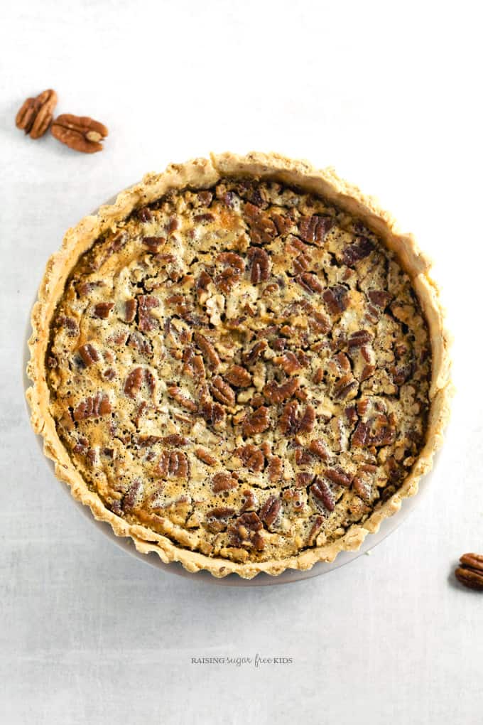 Lower Sugar Pecan Pie (Gluten Free) | Raising Sugar Free Kids - every bit as delicious as the original, this pecan pie is gluten free and has only 1/3 of the sugar, all of it slow-releasing. Perfect for a healthier Thanksgiving this year. #glutenfree #sugarfree 